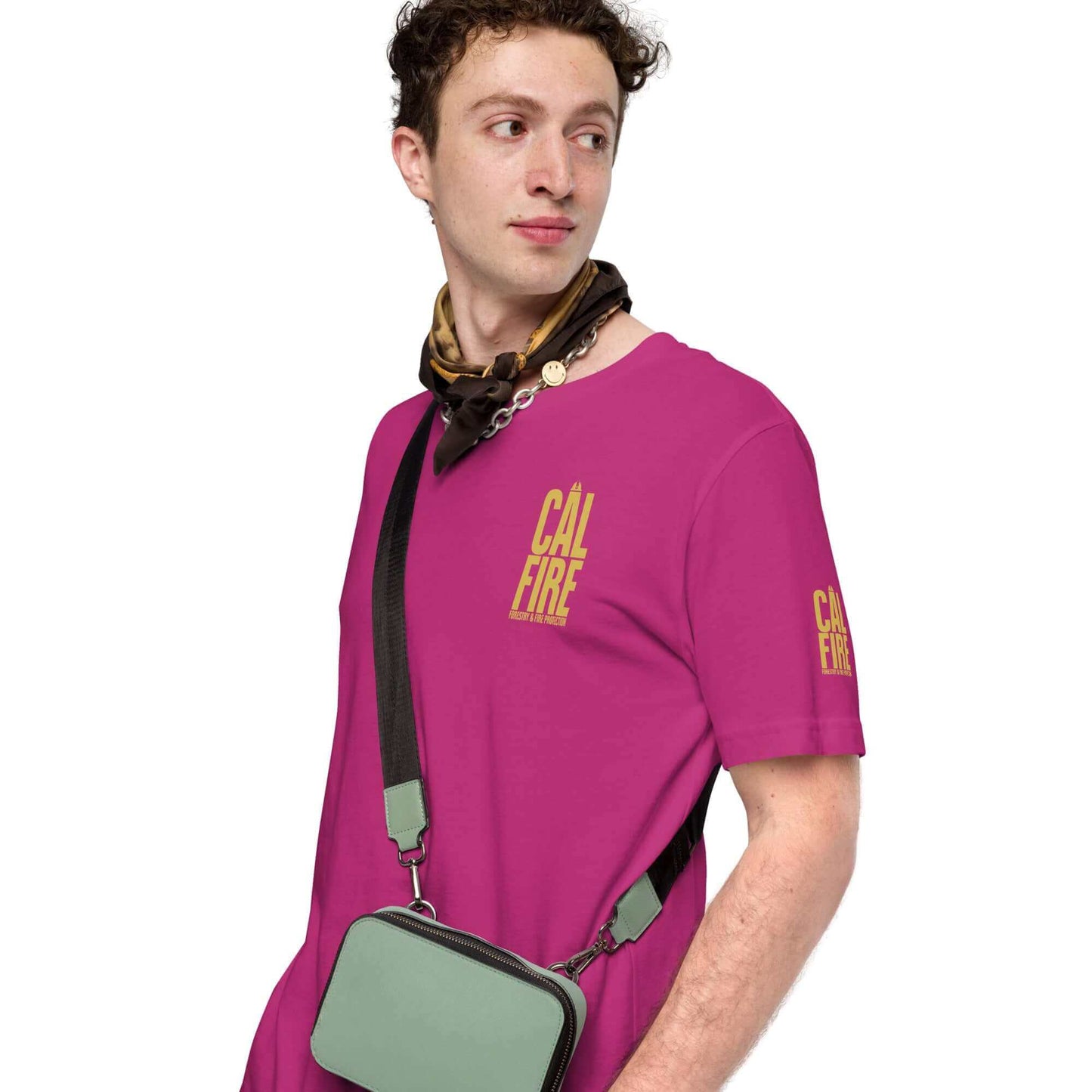 Unisex Cal Fire Forestry Firefighter T-Shirt in pink, honoring brave firefighters, worn by a model with a bag and scarf.