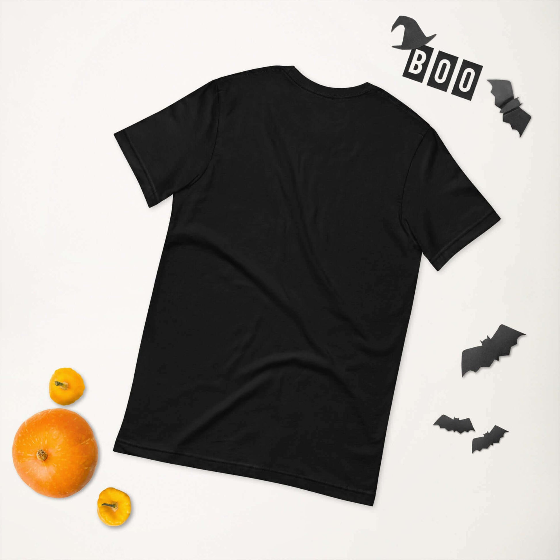 Black t-shirt with Halloween decorations, including bats, "BOO" letters, and pumpkins on a white background.