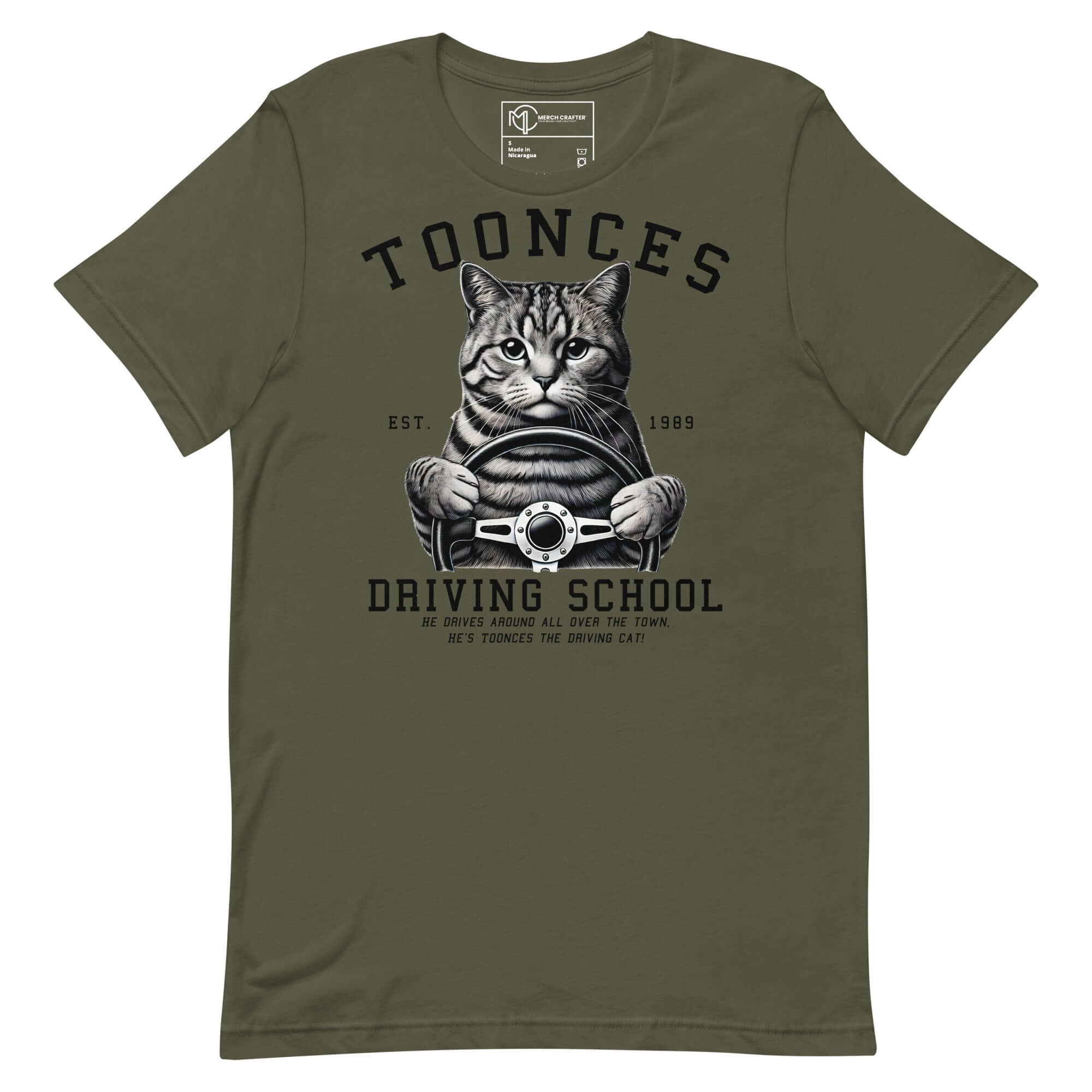 Toonces Driving School unisex t-shirt featuring a cat gripping a steering wheel, established 1989.