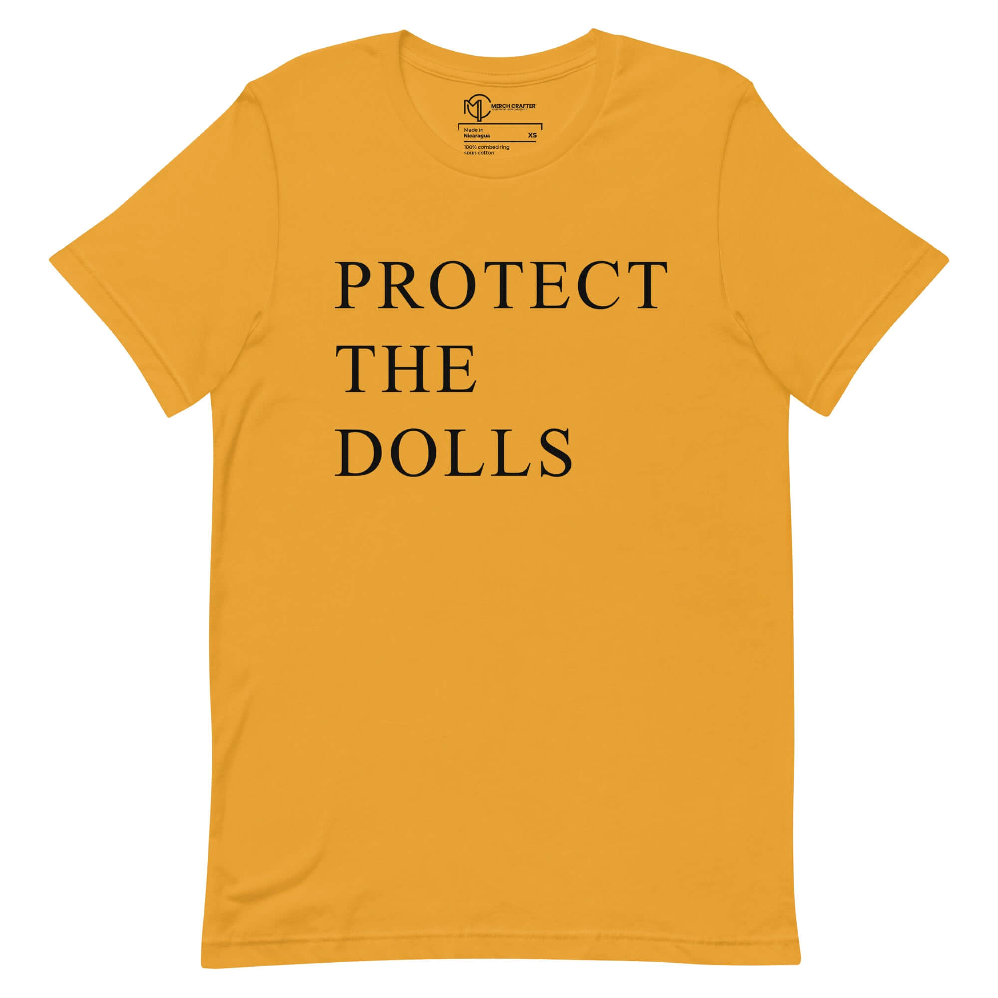 Protect the Dolls unisex t-shirt in yellow, promoting femininity and girlhood with a bold statement.