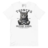 Toonces Driving School t-shirt featuring a cat gripping a steering wheel, established 1989, artistic tribute to SNL's Toonces.