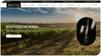 Scenic view of vineyards in New Zealand with a featured wine bottle, promoting boutique NZ wines.